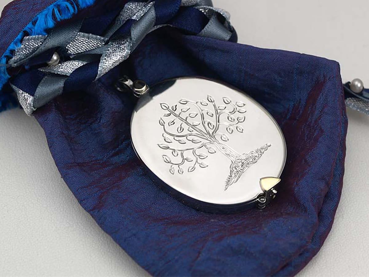 white-gold-locket-on-satin-3-4